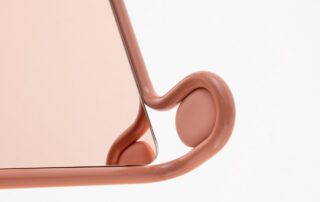 Het frame achter de designspiegel